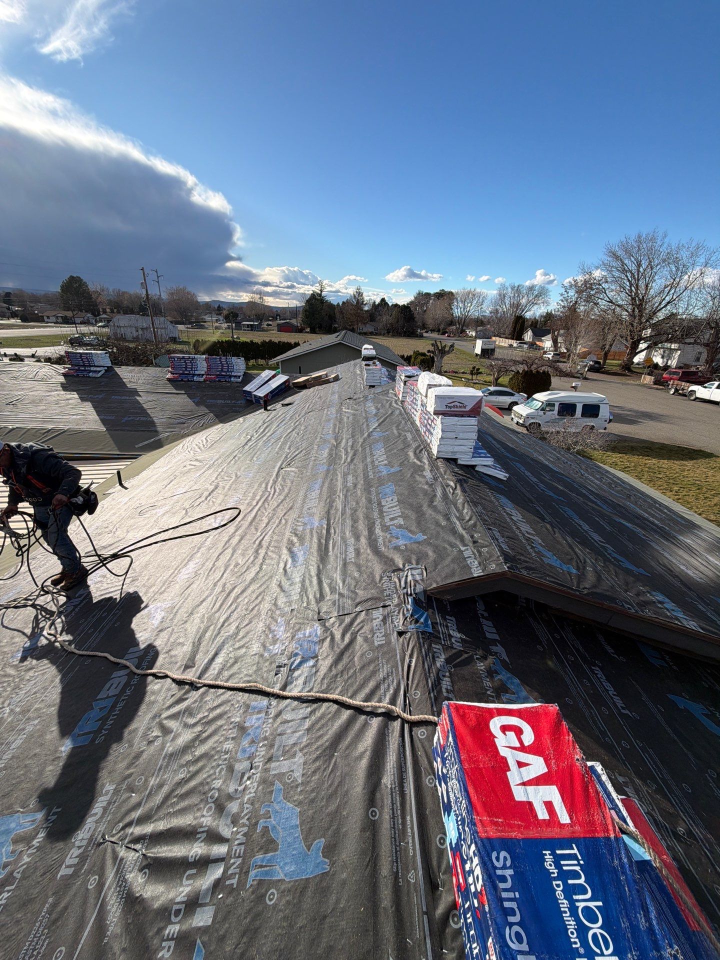Starka Home roofing crew installing underlayment